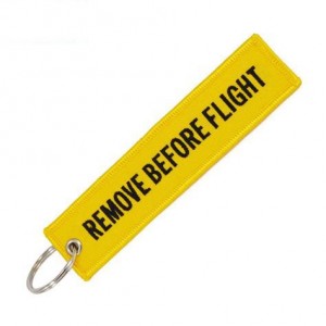 Yellow Remove Before Flight key chain