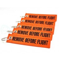 Orange keychain- remove before flight