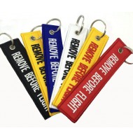 Different colors remove before flight key ring